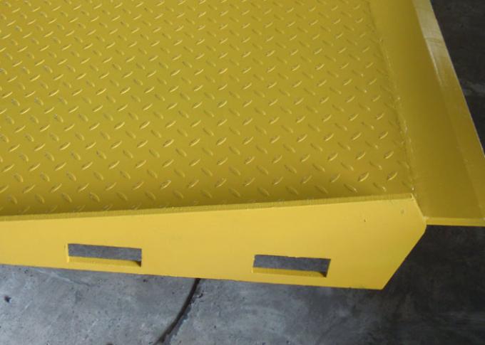 Yellow Loading Ramp Yellow Mobile Hydraulic Loading Ramp On Ground Loading And Unloading